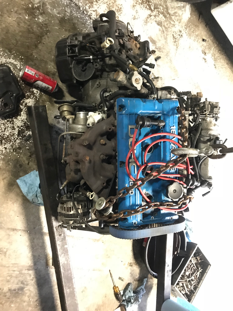 Motor that came out of the rusty 97. Nathan rebuilt this last year, it’s got 2 miles on it. Don’t mind the valve cover it’s hideous and just what came on it. This is the motor going back into the 99.